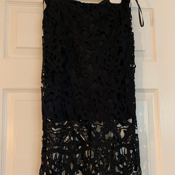 ANGL Dresses & Skirts - Beautiful classy black skirt, perfect for a nice dinner or classy event.